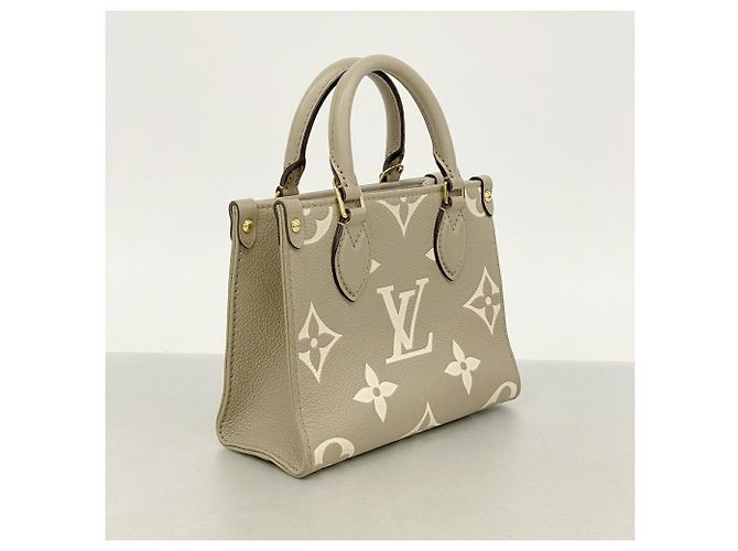 Borsa Louis Vuitton Monogram Empreinte Bicolor OnTheGo BB Beige - vista 2