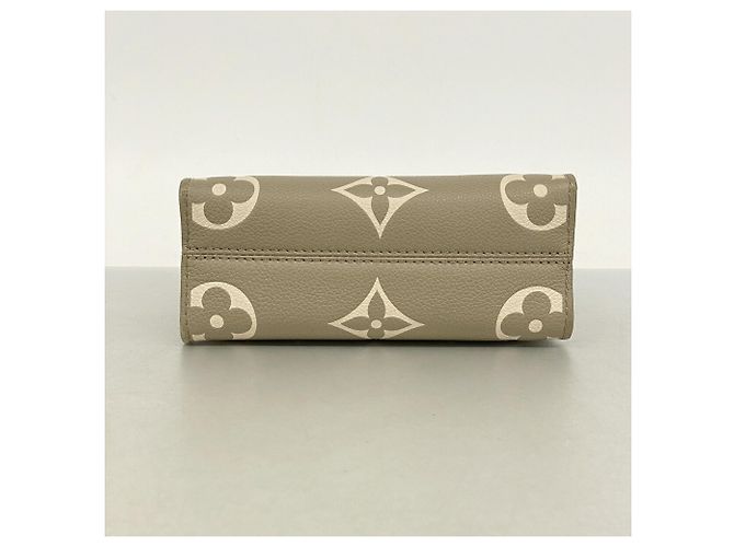 Borsa Louis Vuitton Monogram Empreinte Bicolor OnTheGo BB Beige - vista 3