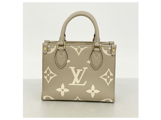 Borsa Louis Vuitton Monogram Empreinte Bicolor OnTheGo BB Beige - vista 9