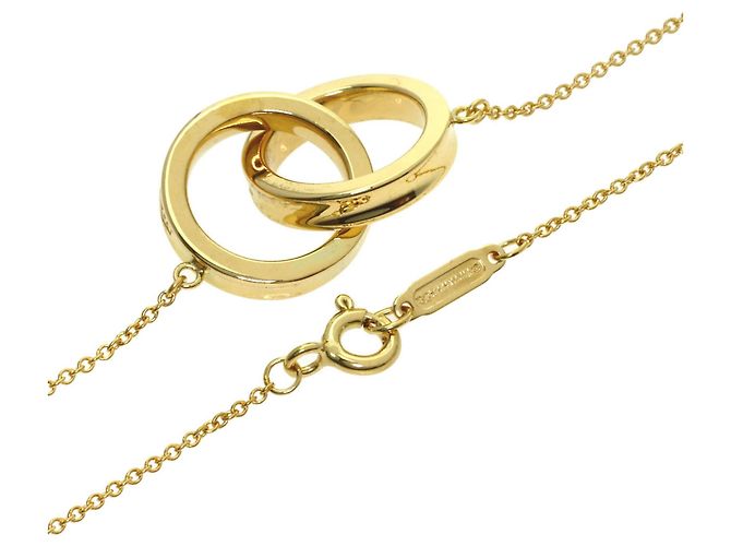 Collana Interlocking di Tiffany & Co. in oro giallo 18K - vista 2