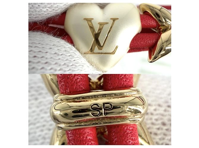 Bracciale con ciondoli Louis Vuitton rosso e bianco - vista 4