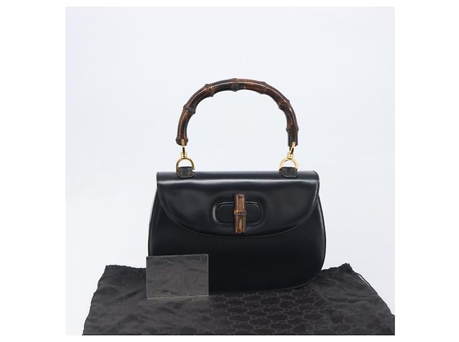 Bolso de mano GUCCI Bamboo de cuero negro y dorado 99 00 0633 Auth 199588V - vista 12
