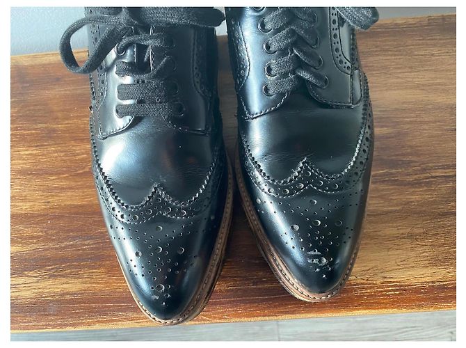 Prada Scarpe Richelieu con plateau in pelle nera e stampa leopardata Nero Stampa leopardo - vista 10