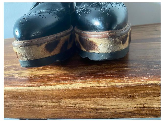 Prada Scarpe Richelieu con plateau in pelle nera e stampa leopardata Nero Stampa leopardo - vista 18