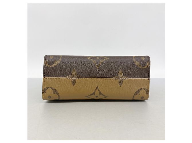Borsa Louis Vuitton Monogram Giant Reverse OnTheGo PM Marrone - vista 3