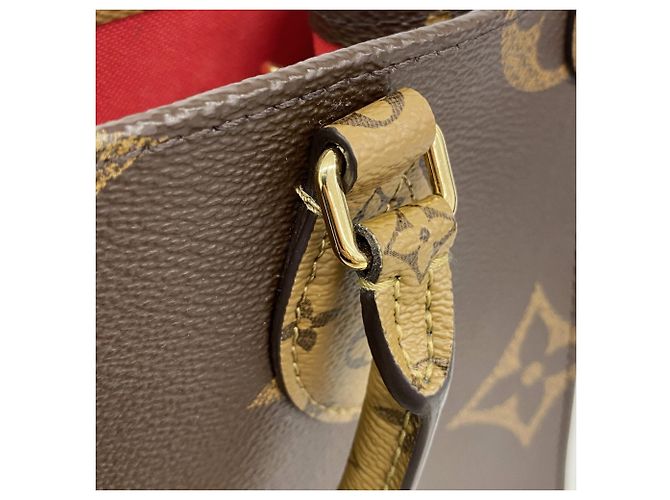 Borsa Louis Vuitton Monogram Giant Reverse OnTheGo PM Marrone - vista 8