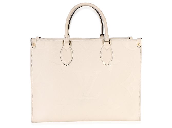 Louis Vuitton Creme Giant Monogram Empreinte Onthego MM Beige - vista 2