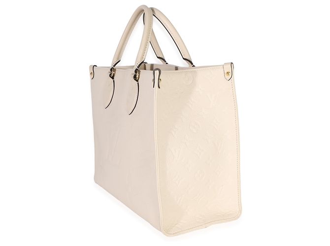 Louis Vuitton Creme Giant Monogram Empreinte Onthego MM Beige - vista 3