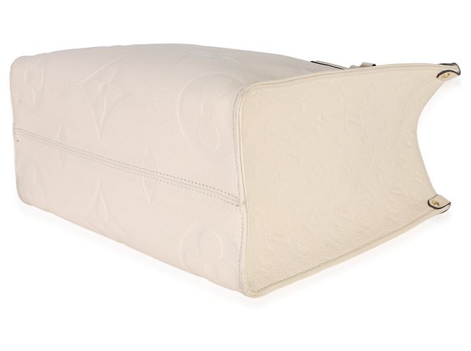 Louis Vuitton Creme Giant Monogram Empreinte Onthego MM Beige - vista 6