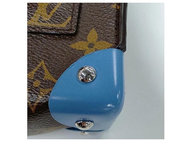 Louis Vuitton Monogram Tribal Pochette Mask GM Castaño - vista 13