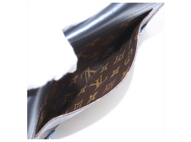 Louis Vuitton Monogram Tribal Pochette Mask GM Castaño - vista 9
