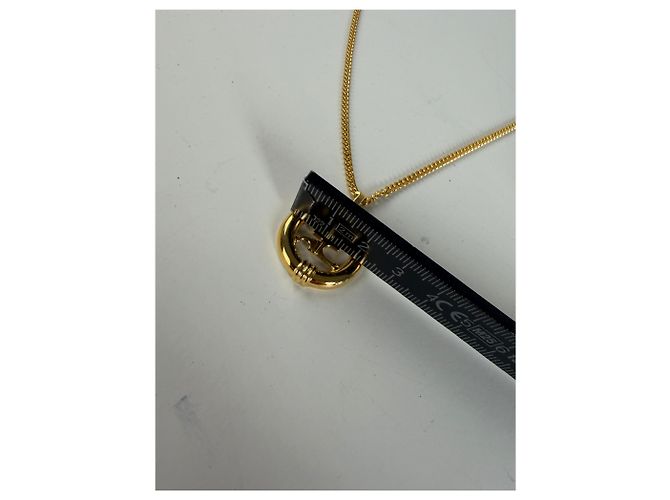 Collana con pendente logo Courreges vintage in metallo dorato - vista 8