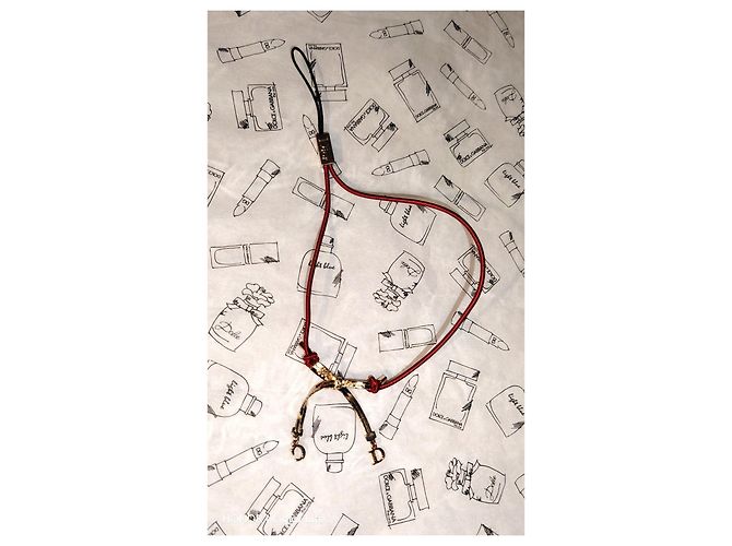 Bracciale Dior con cordoncino rosso e fiocco D'oro - vista 3