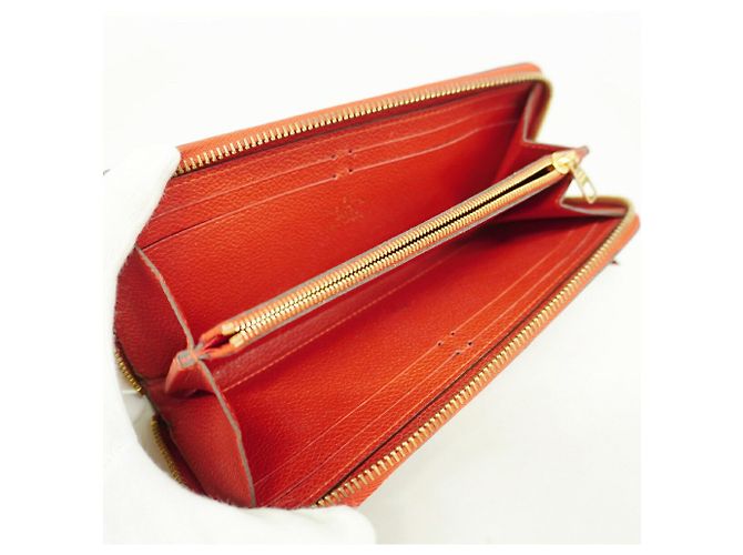 Louis Vuitton Monogram Empreinte Portefeuille Clemence Long Wallet Fuschia - vista 3