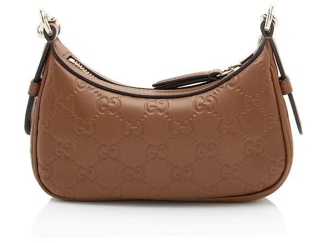 Mini borsa a tracolla in pelle con emblema GG in rilievo Gucci Marrone - vista 3