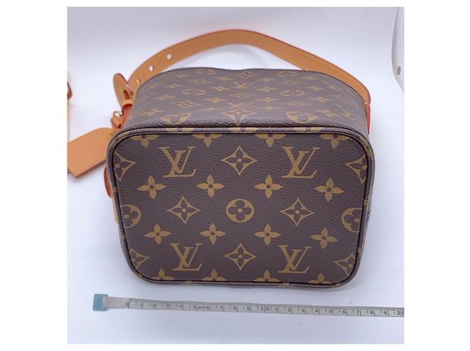 Bolsa bucket Louis Vuitton Monogram Marrom - vista 7