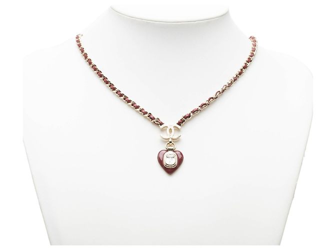 Collana Chanel Gold CC Placcata Oro e Pelle Intrecciata con Pendente a Cuore in Resina e Cristalli D'oro - vista 8
