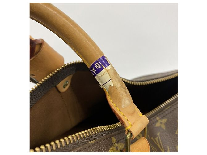 Louis Vuitton Boston Monogram Keepall 60 Marrom - vista 9