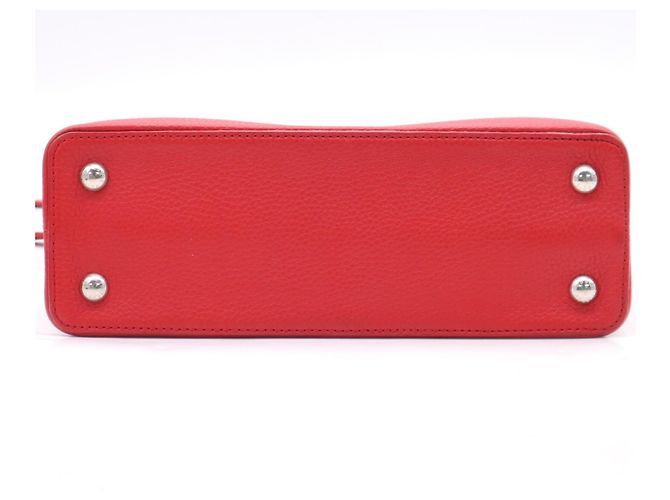 Borsa Louis Vuitton Capucines PM in pelle Taurillon Rosso - vista 8