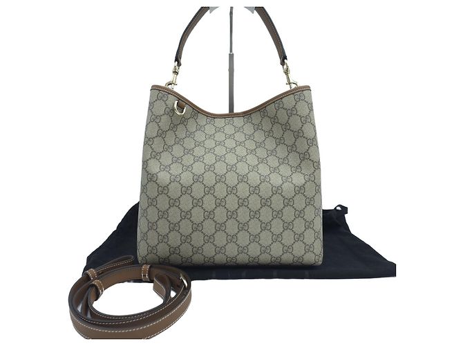 Gucci Borsa a secchiello media GG Emblem
Tote GG Supreme Canvas
Borsa a tracolla Crossbody Hobo Marrone - vista 11