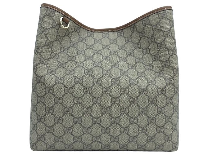 Gucci Borsa a secchiello media GG Emblem
Tote GG Supreme Canvas
Borsa a tracolla Crossbody Hobo Marrone - vista 2
