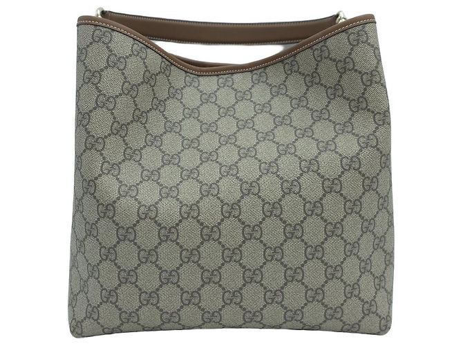 Gucci Borsa a secchiello media GG Emblem
Tote GG Supreme Canvas
Borsa a tracolla Crossbody Hobo Marrone - vista 5