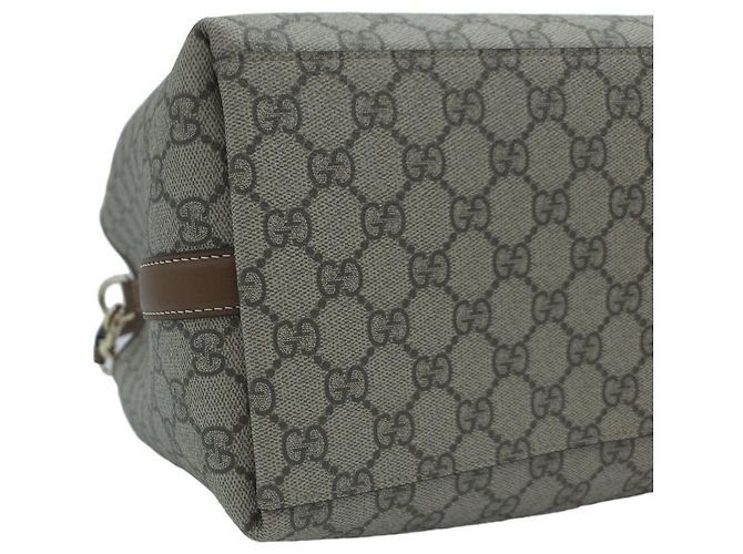 Gucci Borsa a secchiello media GG Emblem
Tote GG Supreme Canvas
Borsa a tracolla Crossbody Hobo Marrone - vista 6