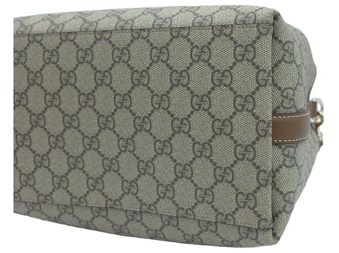 Gucci Borsa a secchiello media GG Emblem
Tote GG Supreme Canvas
Borsa a tracolla Crossbody Hobo Marrone - vista 7