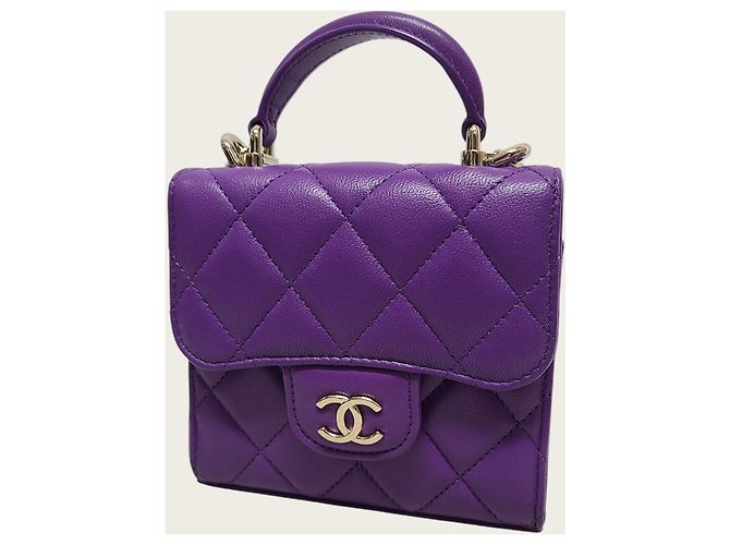 Chanel Mini Bolsa Chip em pele de cordeiro roxa com alça de mão e corrente dourada Roxo - vista 2