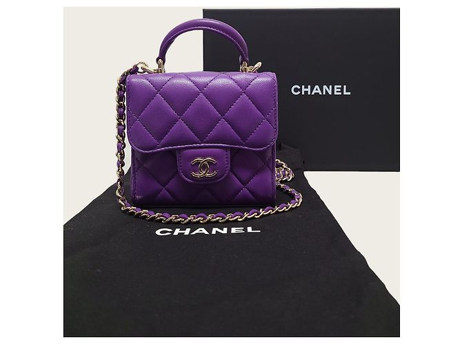 Chanel Mini Bolsa Chip em pele de cordeiro roxa com alça de mão e corrente dourada Roxo - vista 7