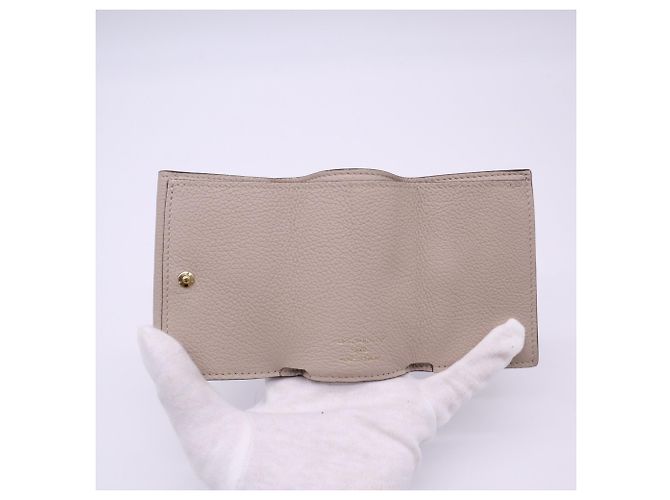 Louis Vuitton Taurillon Portefeuille Lock Mini Tourtrell Wallet Beige - vista 11