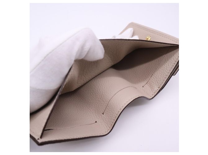 Louis Vuitton Taurillon Portefeuille Lock Mini Tourtrell Wallet Beige - vista 13