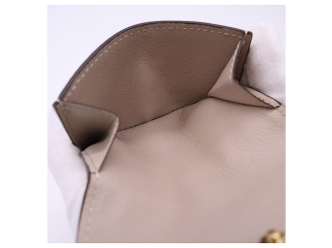 Louis Vuitton Taurillon Portefeuille Lock Mini Tourtrell Wallet Beige - vista 14