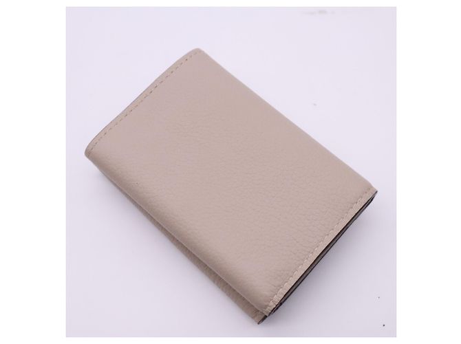 Louis Vuitton Taurillon Portefeuille Lock Mini Tourtrell Wallet Beige - vista 2