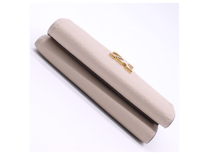 Louis Vuitton Taurillon Portefeuille Lock Mini Tourtrell Wallet Beige - vista 7