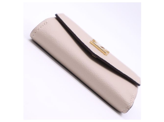 Louis Vuitton Taurillon Portefeuille Lock Mini Tourtrell Wallet Beige - vista 8