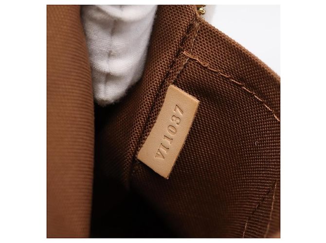Louis Vuitton Riveting Monogram Canvas Marrone - vista 7