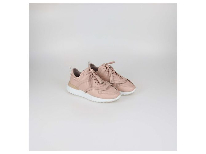 Sneakers basse Tod's in pelle traforata rosa con frange e nappe - vista 2