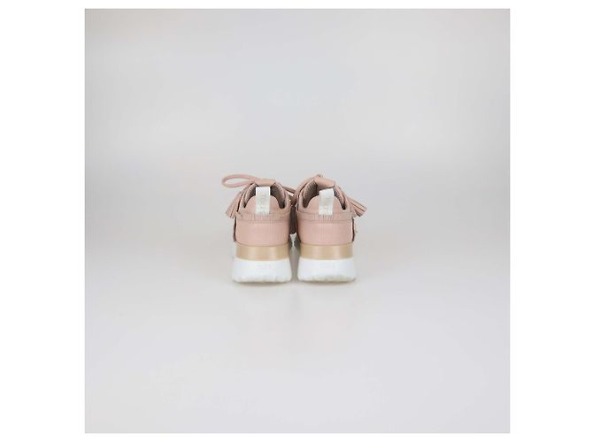 Sneakers basse Tod's in pelle traforata rosa con frange e nappe - vista 5