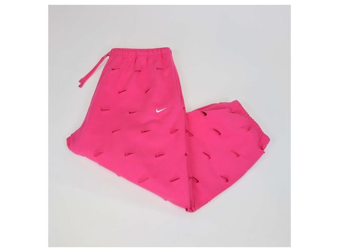 Autre Marque Nike x Jacquemus Pantalones de chándal de algodón rosa con Swoosh troquelado - vista 3
