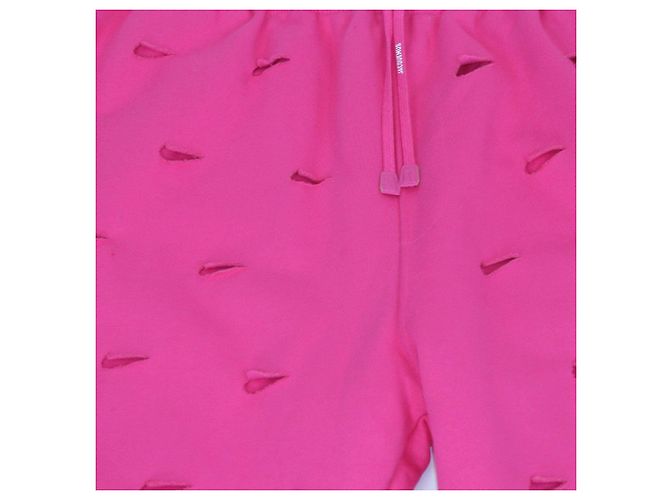 Autre Marque Nike x Jacquemus Pantalones de chándal de algodón rosa con Swoosh troquelado - vista 4