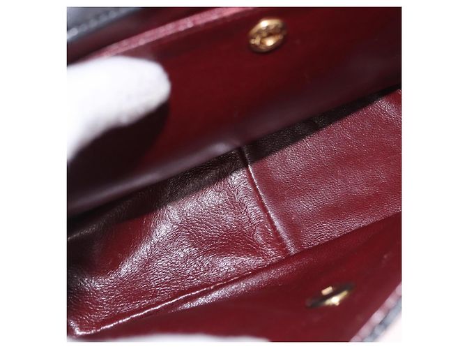 Borsa a tracolla CHANEL Matelasse con catena in pelle d'agnello nera e oro CC Auth 202003SAV Nero D'oro - vista 20