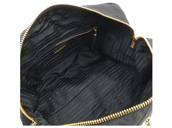Prada Triangle gesteppte Schultertasche Schwarz Weiß - Ansicht 7