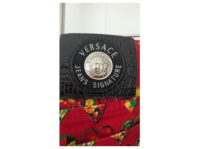 Pantaloni Versace Jeans Signature Stampa Cuori Arancione - vista 9