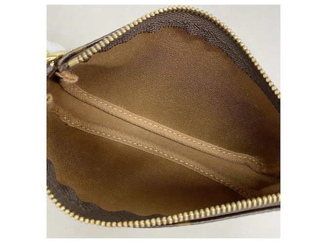 Louis Vuitton Monogram Mini Pochette Accessoires Castaño - vista 4