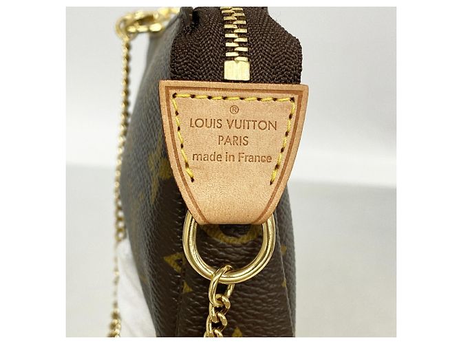 Louis Vuitton Monogram Mini Pochette Accessoires Castaño - vista 5