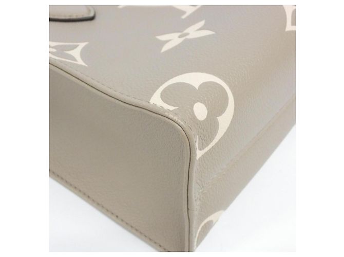 Borsa Louis Vuitton Bicolor Monogram Empreinte OnTheGo PM Multicolore Grigio Monogramma - vista 2