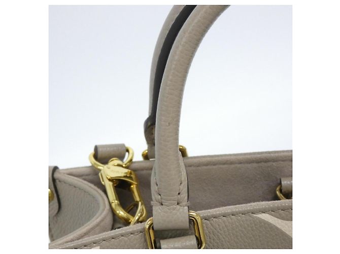 Borsa Louis Vuitton Bicolor Monogram Empreinte OnTheGo PM Multicolore Grigio Monogramma - vista 3