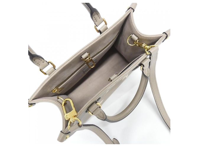 Borsa Louis Vuitton Bicolor Monogram Empreinte OnTheGo PM Multicolore Grigio Monogramma - vista 5