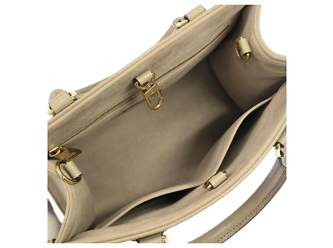 Borsa Louis Vuitton Bicolor Monogram Empreinte OnTheGo PM Multicolore Grigio Monogramma - vista 7